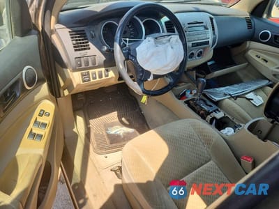 Zdjęcie 8 z 12 samochodu: 2009 TOYOTA TACOMA V6 VIN:3TMLU42N39M027768 - miniatura