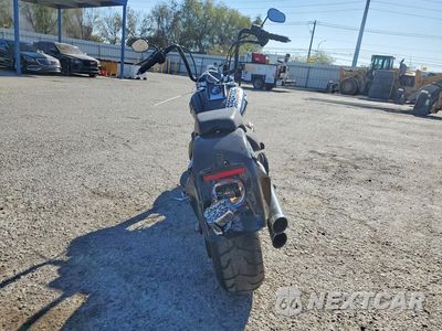 Czwarte zdjęcie samochodu z boku: 2013 HARLEY-DAVIDSON FLSTFB FATBOY LO VIN:1HD1JNV13DB017013 - miniatura