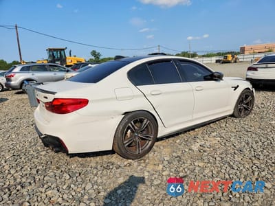 Trzecie zdjęcie samochodu z tyłu: 2019 BMW M5 VIN:WBSJF0C54KB284243 - miniatura