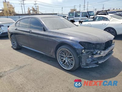 Czwarte zdjęcie samochodu z boku: 2019 BMW 740 I VIN:WBA7E2C53KB217193 - miniatura