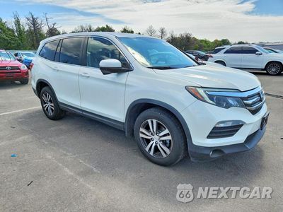 Czwarte zdjęcie samochodu z boku: 2017 HONDA PILOT EXL VIN:5FNYF6H81HB096250 - miniatura