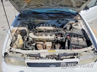 Zdjęcie 11 z 12 samochodu: 1994 NISSAN SENTRA E VIN:1N4EB32H4RC767923 - miniatura