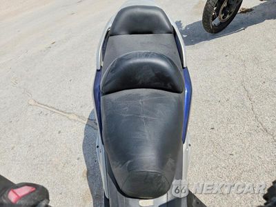 Piąte zdjęcie samochodu w środku: 2006 HONDA FSC600 D VIN:JH2PF01106K400259 - miniatura