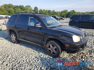 Czwarte zdjęcie samochodu z boku: 2004 HYUNDAI SANTA FE GLS VIN:KM8SC13DX4U769409 - miniatura
