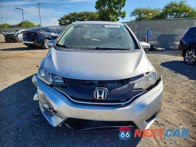Piąte zdjęcie samochodu w środku: 2016 HONDA FIT EX VIN:JHMGK5H74GS008753 - miniatura