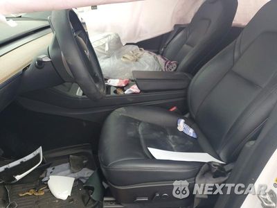 Zdjęcie 7 z 13 samochodu: 2023 TESLA MODEL Y VIN:7SAYGAEE8PF605150 - miniatura