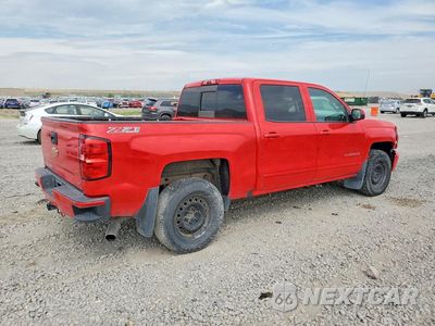Trzecie zdjęcie samochodu z tyłu: 2016 CHEVROLET SILVERADO K1500 LT VIN:3GCUKREC3GG367340 - miniatura