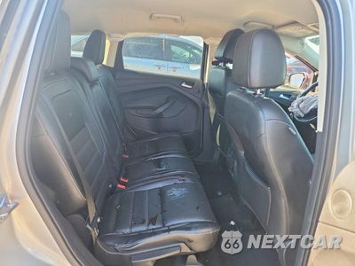Zdjęcie 10 z 13 samochodu: 2017 FORD ESCAPE TITANIUM VIN:1FMCU0J99HUD94693 - miniatura