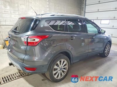 Trzecie zdjęcie samochodu z tyłu: 2017 FORD ESCAPE TITANIUM VIN:1FMCU9J97HUB33454 - miniatura