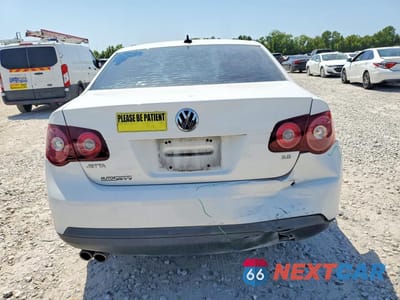 Zdjęcie 6 z 12 samochodu: 2010 VOLKSWAGEN JETTA SE VIN:3VWRX7AJ0AM046040 - miniatura