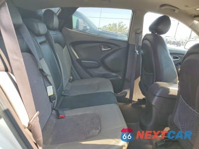 Zdjęcie 11 z 13 samochodu: 2010 HYUNDAI TUCSON GLS VIN:KM8JU3AC9AU096395 - miniatura