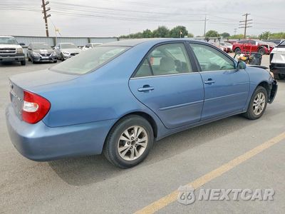 Trzecie zdjęcie samochodu z tyłu: 2004 TOYOTA CAMRY LE V6 VIN:4T1BF32K74U571504 - miniatura