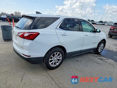 Trzecie zdjęcie samochodu z tyłu: 2018 CHEVROLET EQUINOX LT VIN:3GNAXJEV6JS559323 - miniatura