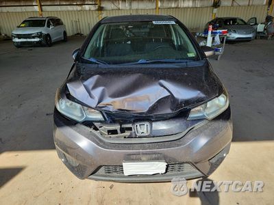 Piąte zdjęcie samochodu w środku: 2016 HONDA FIT LX VIN:JHMGK5H54GS010369 - miniatura