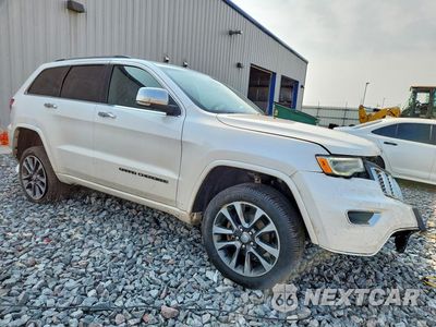 Czwarte zdjęcie samochodu z boku: 2017 JEEP GRAND CHEROKEE OVERLAND VIN:1C4RJFCGXHC875239 - miniatura