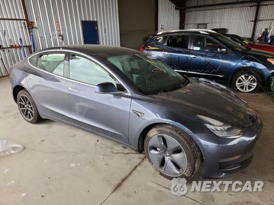 Czwarte zdjęcie samochodu z boku: 2020 TESLA MODEL 3 VIN:5YJ3E1EAXLF804821 - miniatura