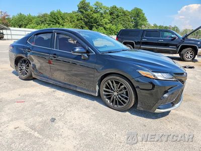 Czwarte zdjęcie samochodu z boku: 2023 TOYOTA CAMRY XSE VIN:4T1K61AK1PU727742 - miniatura
