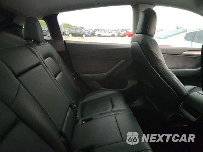 Zdjęcie 10 z 12 samochodu: 2023 TESLA MODEL Y VIN:7SAYGDEE5PF610503 - miniatura