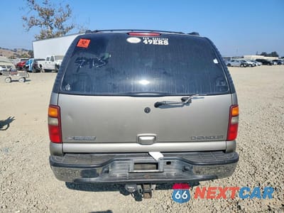 Zdjęcie 6 z 13 samochodu: 2002 CHEVROLET TAHOE K1500 VIN:1GNEK13T72R163150 - miniatura