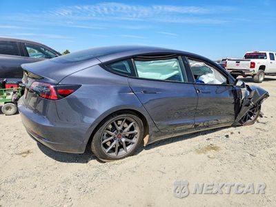 Trzecie zdjęcie samochodu z tyłu: 2023 TESLA MODEL 3 VIN:5YJ3E1EA2PF711538 - miniatura