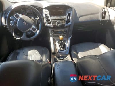 Zdjęcie 8 z 13 samochodu: 2013 FORD FOCUS TITANIUM VIN:1FADP3N23DL142166 - miniatura