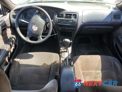 Zdjęcie 8 z 12 samochodu: 1994 TOYOTA COROLLA DX VIN:1NXAE09B5RZ219032 - miniatura