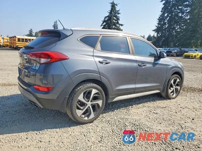 Trzecie zdjęcie samochodu z tyłu: 2017 HYUNDAI TUCSON SPORT VIN:KM8J3CA26HU394116 - miniatura