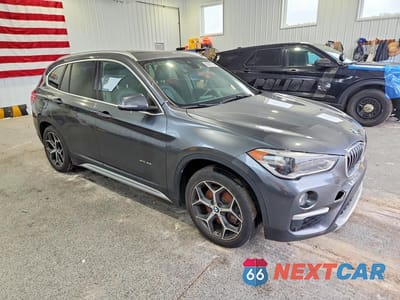 Czwarte zdjęcie samochodu z boku: 2016 BMW X1 XDRIVE28I VIN:WBXHT3C31G5E47182 - miniatura