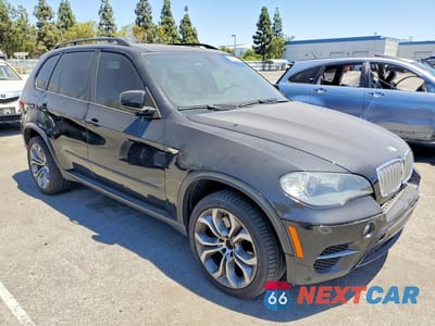 Czwarte zdjęcie samochodu z boku: 2011 BMW X5 XDRIVE50I VIN:5UXZV8C55BL418892 - miniatura