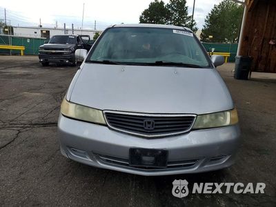 Piąte zdjęcie samochodu w środku: 2001 HONDA ODYSSEY EX VIN:2HKRL18641H549993 - miniatura