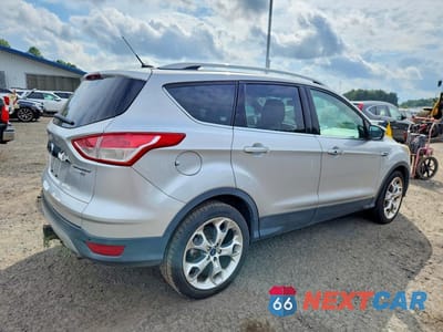 Trzecie zdjęcie samochodu z tyłu: 2016 FORD ESCAPE TITANIUM VIN:1FMCU9J98GUB90633 - miniatura