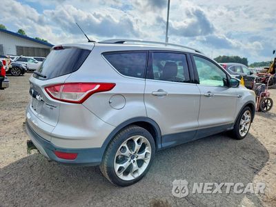 Trzecie zdjęcie samochodu z tyłu: 2016 FORD ESCAPE TITANIUM VIN:1FMCU9J98GUB90633 - miniatura