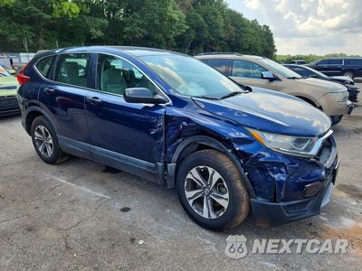 Czwarte zdjęcie samochodu z boku: 2017 HONDA CR-V LX VIN:2HKRW6H31HH222147 - miniatura