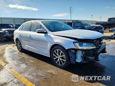 Czwarte zdjęcie samochodu z boku: 2017 VOLKSWAGEN JETTA SE VIN:3VWDB7AJ9HM311959 - miniatura