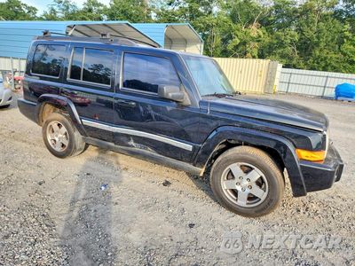 Czwarte zdjęcie samochodu z boku: 2010 JEEP COMMANDER SPORT VIN:1J4RG4GK2AC110009 - miniatura