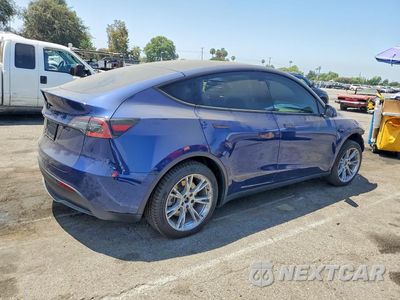 Trzecie zdjęcie samochodu z tyłu: 2023 TESLA MODEL Y VIN:7SAYGDED8PF960571 - miniatura