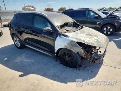 Czwarte zdjęcie samochodu z boku: 2017 HYUNDAI TUCSON SE VIN:KM8J33A46HU306098 - miniatura
