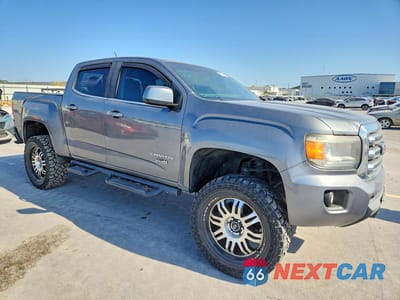 Czwarte zdjęcie samochodu z boku: 2018 GMC CANYON SLE VIN:1GTG6CEN4J1319027 - miniatura