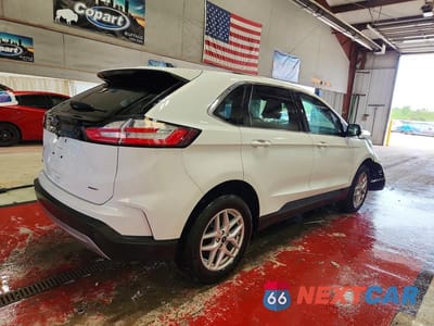 Trzecie zdjęcie samochodu z tyłu: 2024 FORD EDGE SEL VIN:2FMPK4J99RBA99339 - miniatura