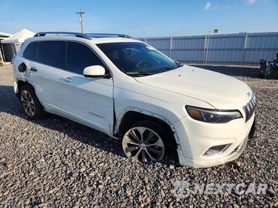 Czwarte zdjęcie samochodu z boku: 2019 JEEP CHEROKEE OVERLAND VIN:1C4PJMJX7KD421112 - miniatura