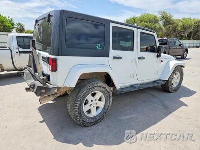 Trzecie zdjęcie samochodu z tyłu: 2015 JEEP WRANGLER UNLIMITED SAHARA VIN:1C4BJWEG6FL621815 - miniatura
