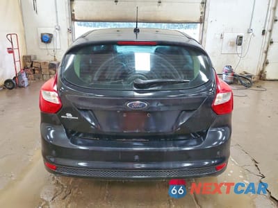 Zdjęcie 6 z 12 samochodu: 2013 FORD FOCUS TITANIUM VIN:1FADP3N24DL304015 - miniatura