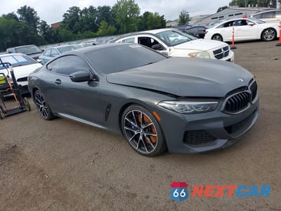 Czwarte zdjęcie samochodu z boku: 2019 BMW M850XI VIN:WBABC4C5XKBU96587 - miniatura