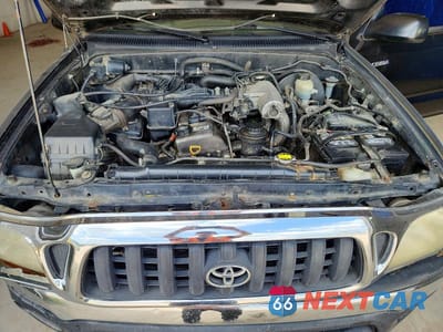 Zdjęcie 11 z 12 samochodu: 2002 TOYOTA TACOMA BASE VIN:5TEWM72N32Z117798 - miniatura
