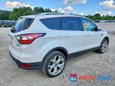 Trzecie zdjęcie samochodu z tyłu: 2018 FORD ESCAPE TITANIUM VIN:1FMCU9J91JUA45912 - miniatura