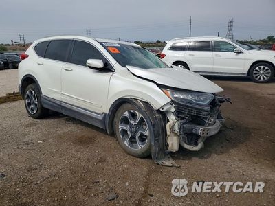 Czwarte zdjęcie samochodu z boku: 2017 HONDA CR-V TOURING VIN:2HKRW1H93HH517130 - miniatura
