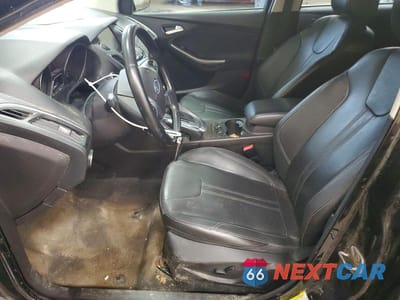 Zdjęcie 7 z 12 samochodu: 2013 FORD FOCUS TITANIUM VIN:1FADP3N24DL304015 - miniatura