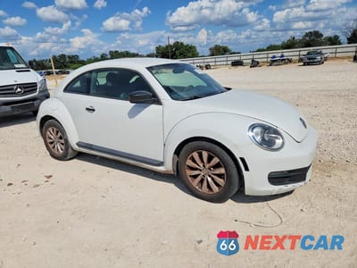 Czwarte zdjęcie samochodu z boku: 2016 VOLKSWAGEN BEETLE 1.8T VIN:3VWF17AT8GM606210 - miniatura