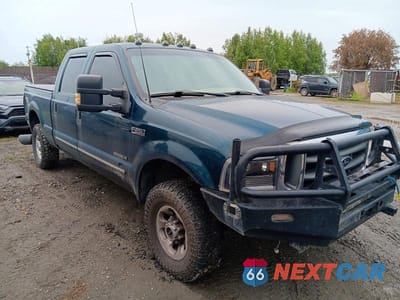 Czwarte zdjęcie samochodu z boku: 1999 FORD F250 SUPER DUTY VIN:1FTNW21F3XED75154 - miniatura