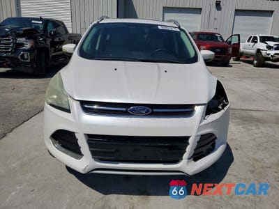 Piąte zdjęcie samochodu w środku: 2014 FORD ESCAPE TITANIUM VIN:1FMCU0JX8EUE20405 - miniatura